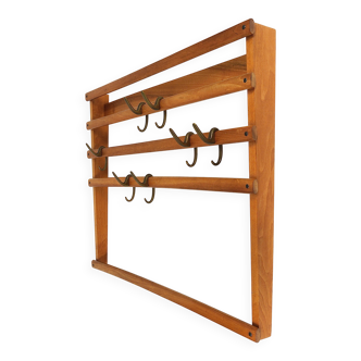 Mid-century Carl Auböck coat rack in beech with 7 brass hooks, 1950s.