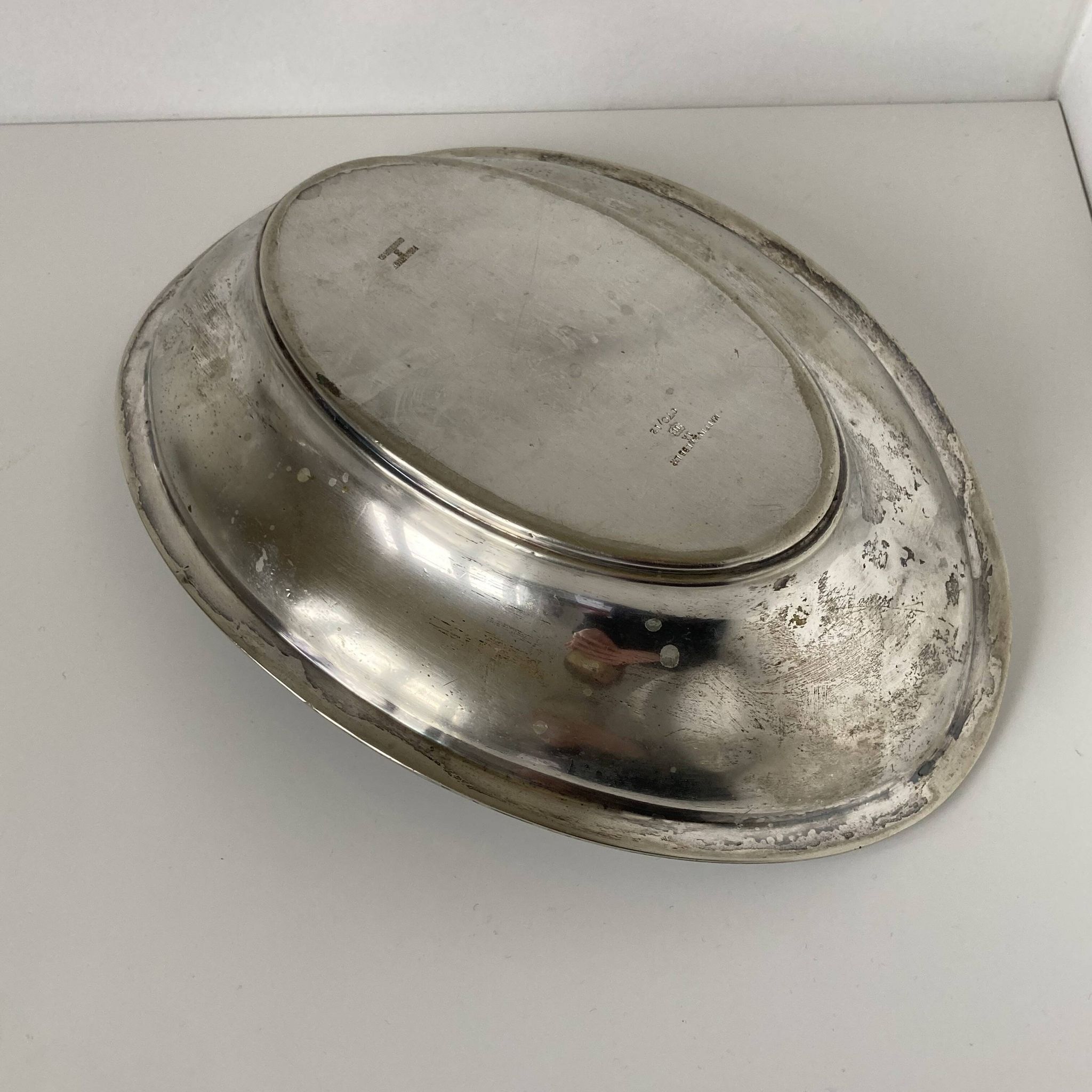 Oval silver-plated tray in the Louis XVI style by Mappin & Webb, London.