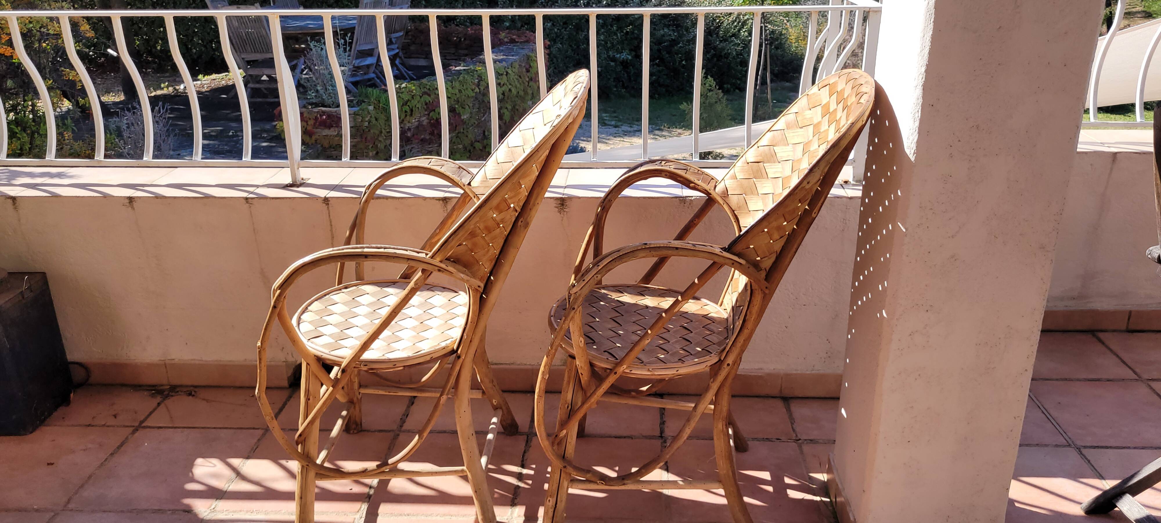 Chestnut braid armchairs from the 70s