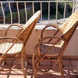 Chestnut braid armchairs from the 70s