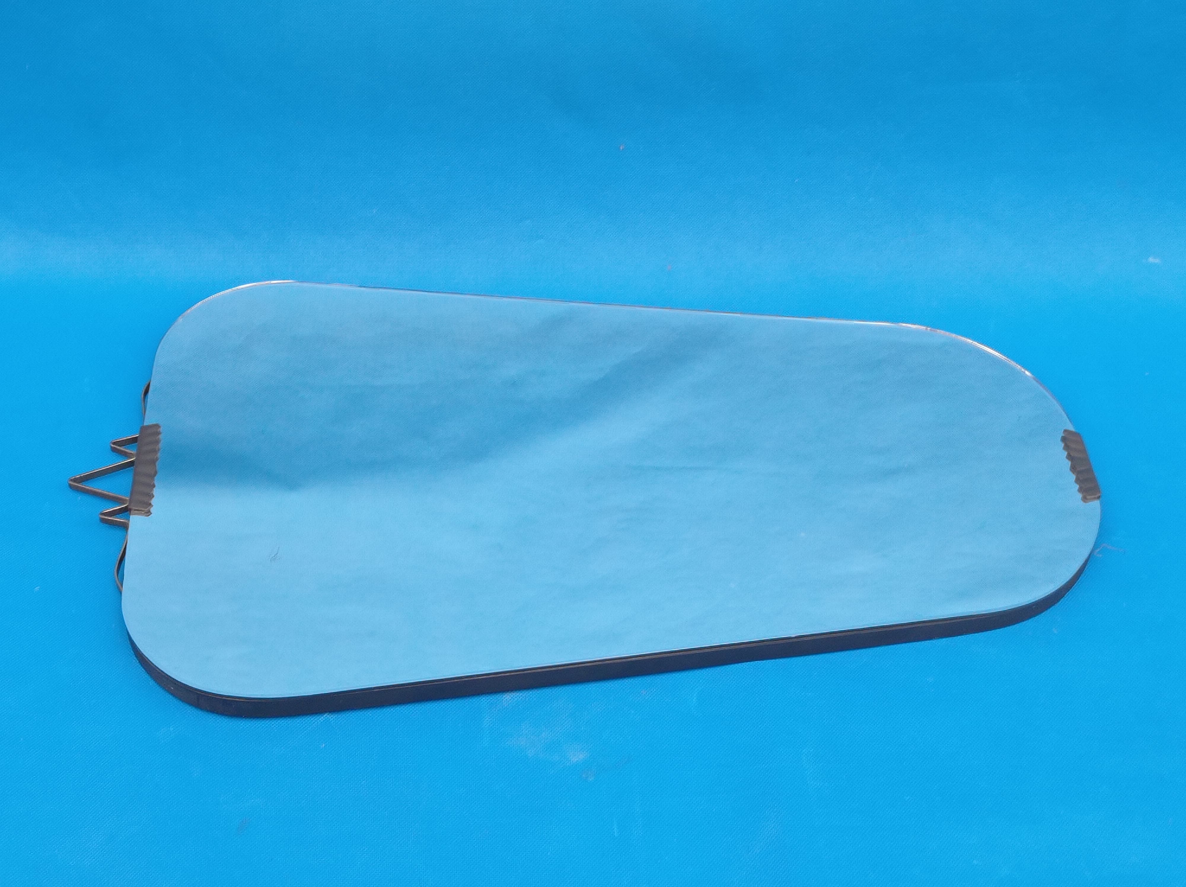 Asymmetrical mirror from the 1960s