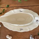 Antique sauce boat in Sarreguemines earthenware.