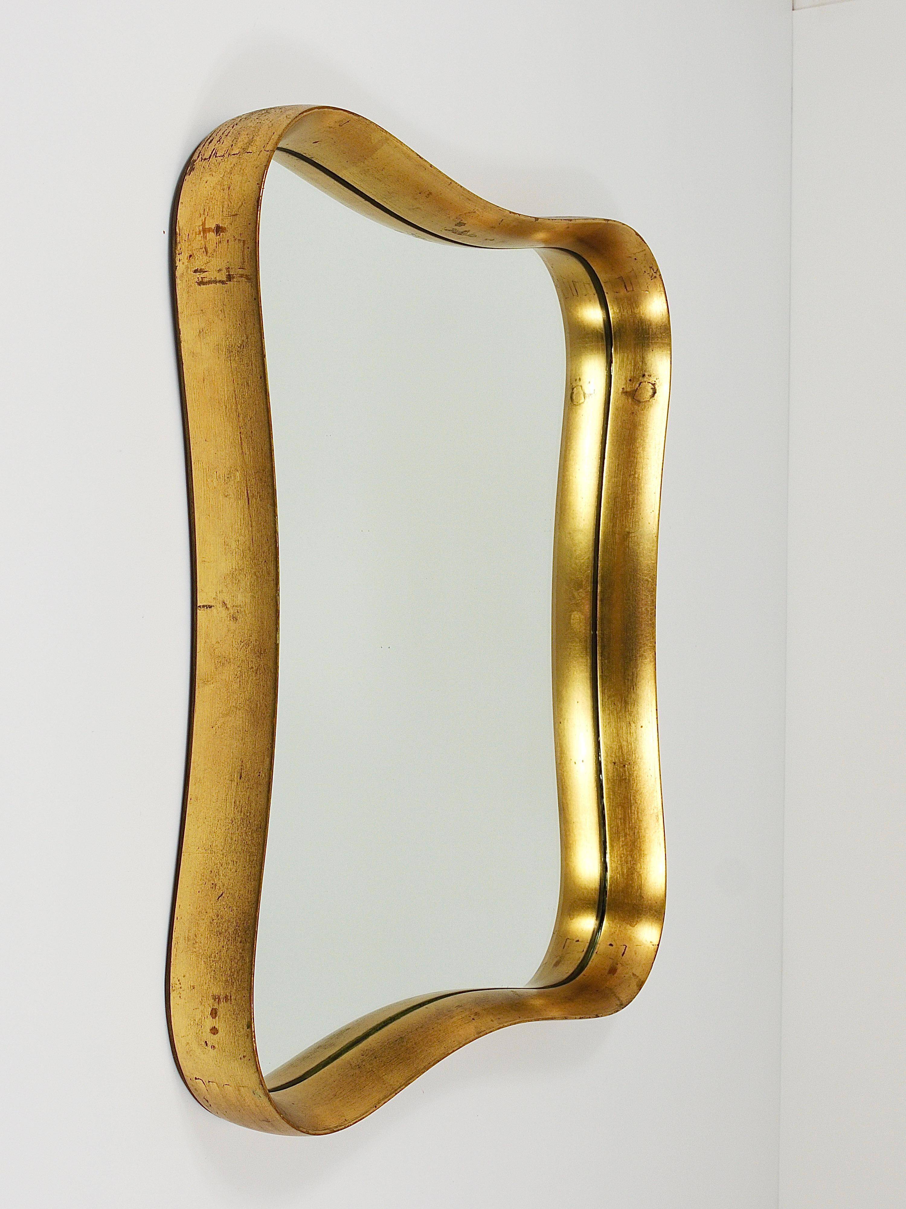 Golden wooden mirror in the style of Gio Ponti by Max Welz, Vienna, Austria, 1940s.
