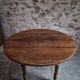 French antique round dining table in walnut, circa 1880–1900.