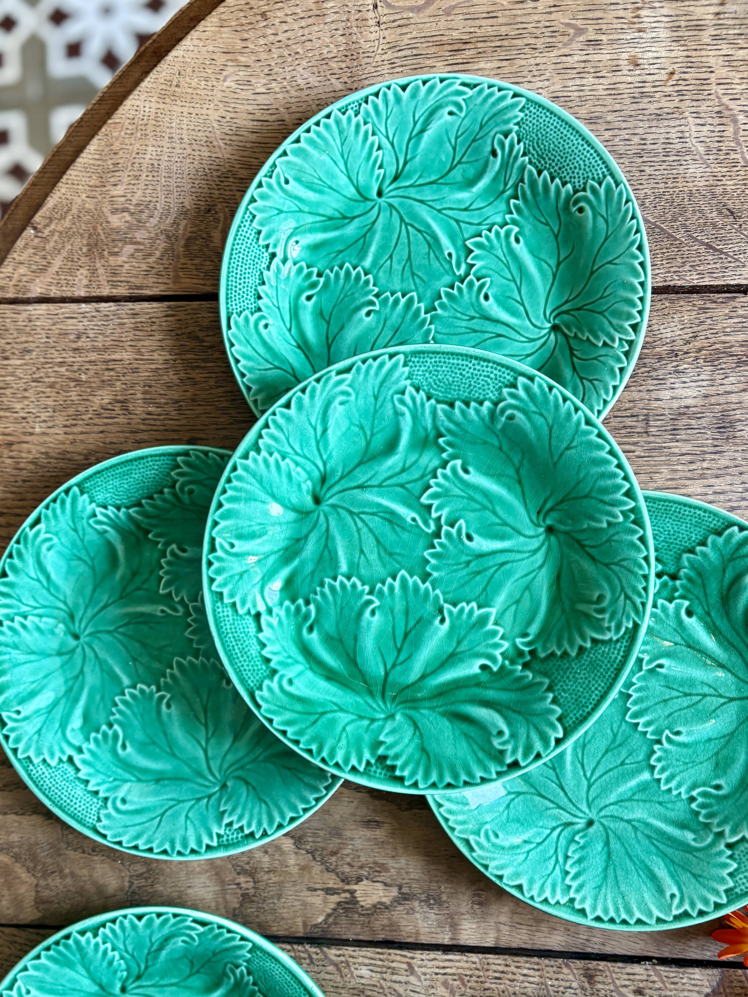 Set of 8 vintage green faience dessert plates, majolica.