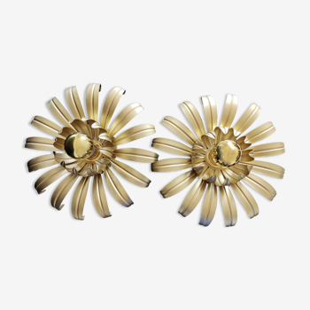 Golden metal flower sconces