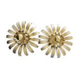 Golden metal flower sconces