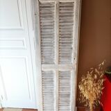 Vintage shutter renovated into a coat rack