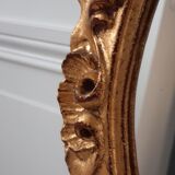 Old mirror in gilded wood late nineteenth