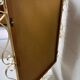 Vintage gold mirror with ornate frame