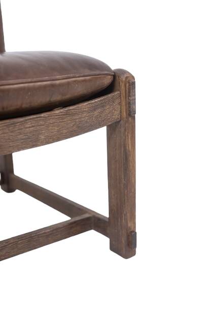 Pair of oak armchairs, upholstered in leather. Work from the 1960s.