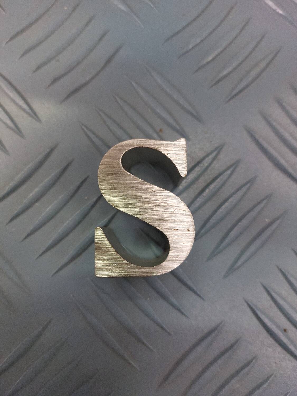 Metal letter "s"
