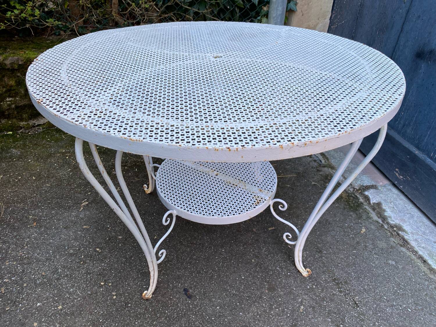 White lacquered perforated metal garden table circa 1950