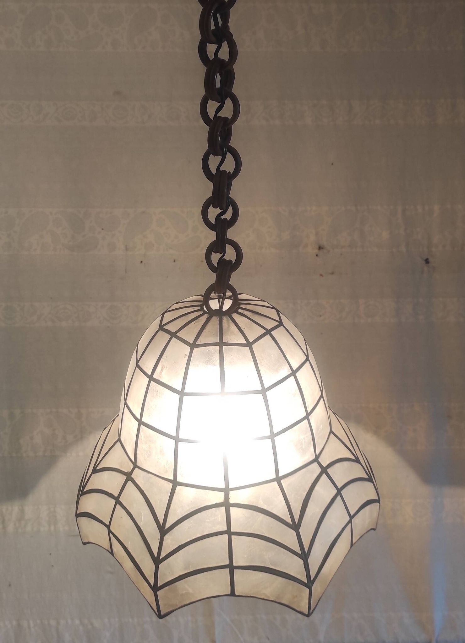 Mother-of-pearl and brass suspension, mid-20th century.