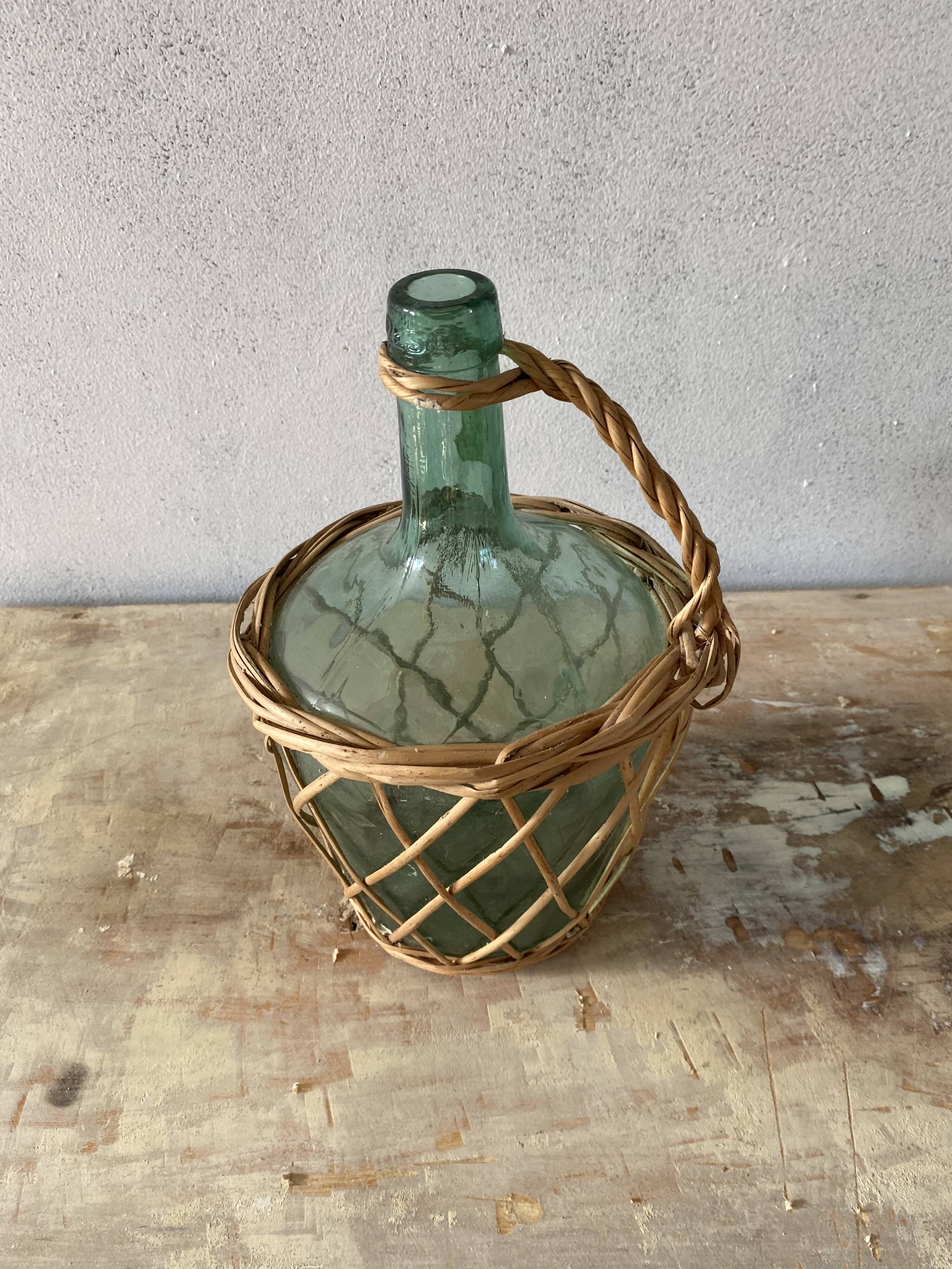 Bouteille dame Jeanne en verre bleu et osier