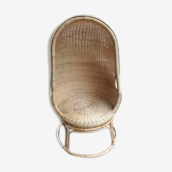 Cocoon armchair in rattan