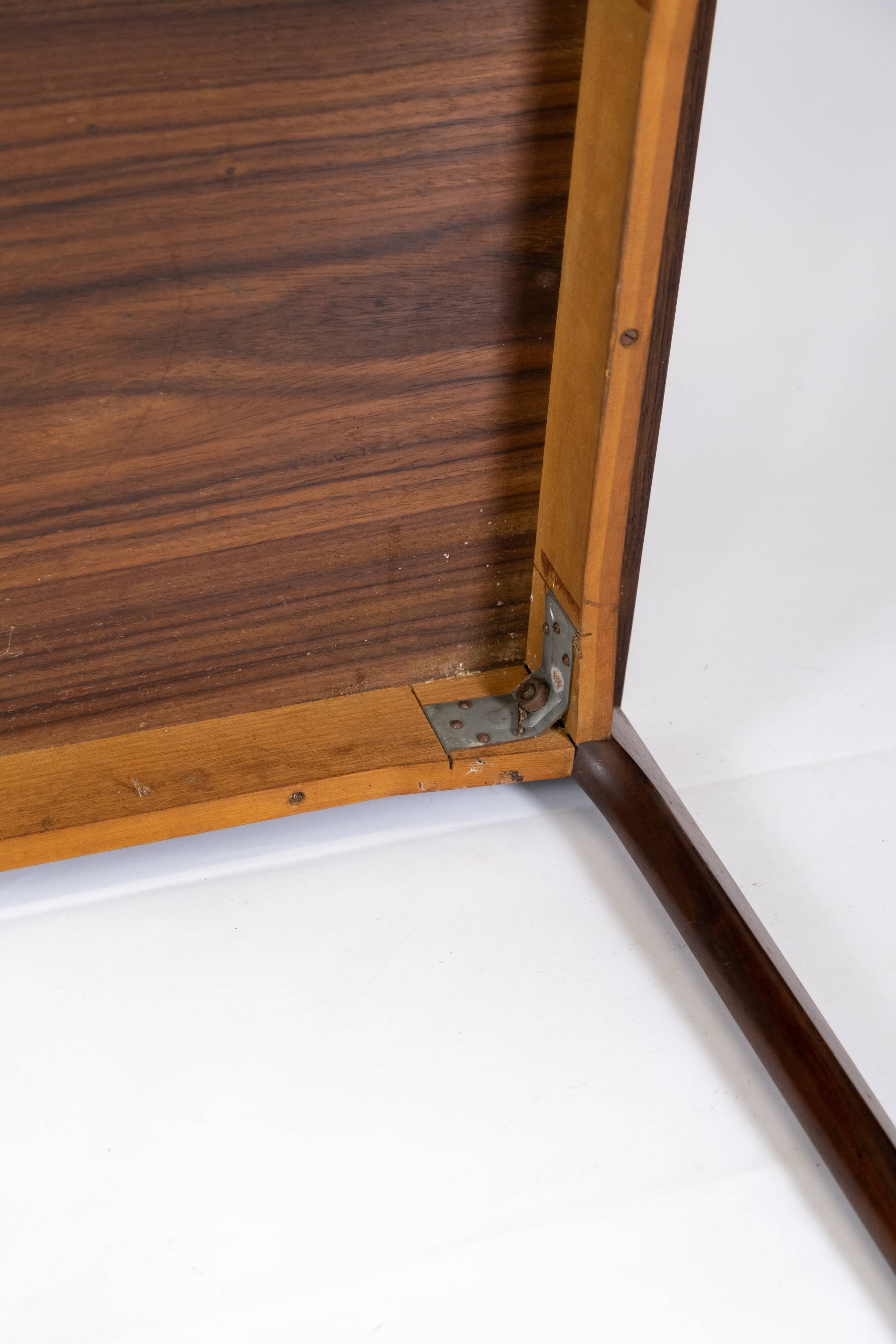 Coffee table in rosewood designed by Henning Kjærnulf, 1960s