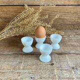 4 egg cups in white opaline glass