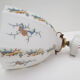 Old wall lamp 45° and its tulip lampshade decorated with flowers