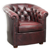 Cowhide Chesterfield club armchair in a red colour in classic English style