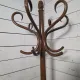 Curved antique wooden parrot