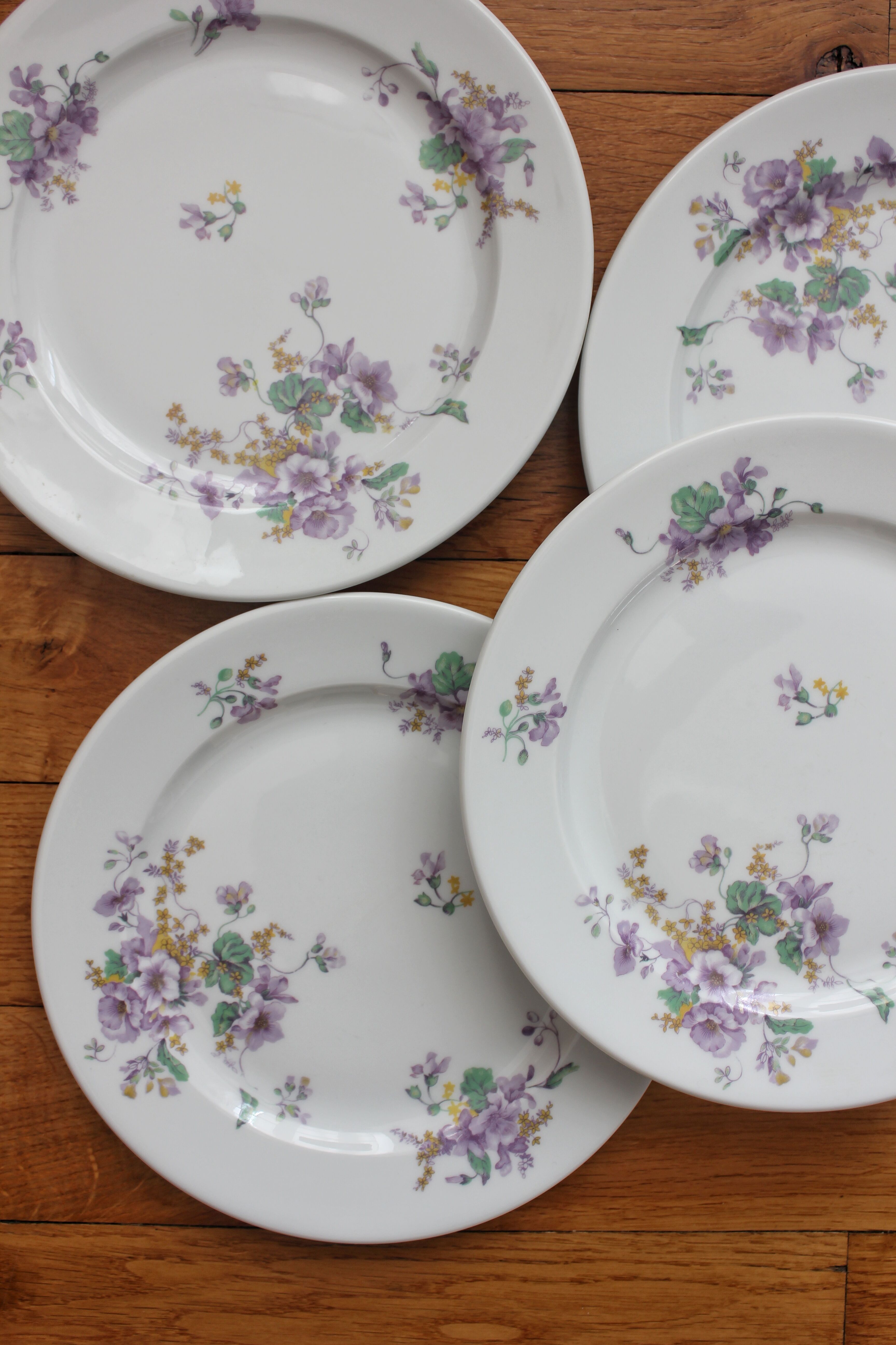 4 porcelain dessert plates decorated with flowers Bernardaud Limoges