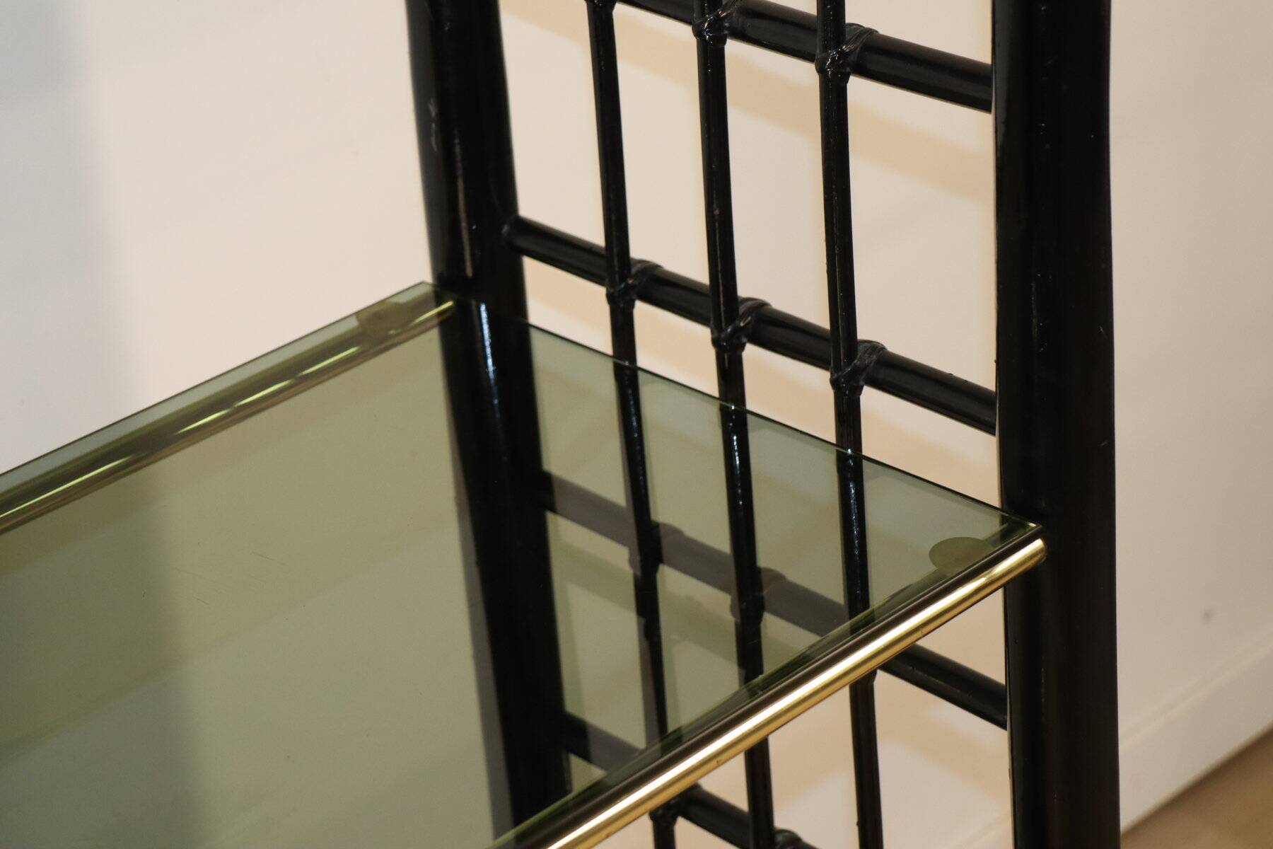 Vintage 1970s shelf in smoked glass with a bamboo-style structure.