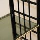 Vintage 1970s shelf in smoked glass with a bamboo-style structure.