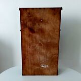 Small antique wall cabinet in Gothic style.