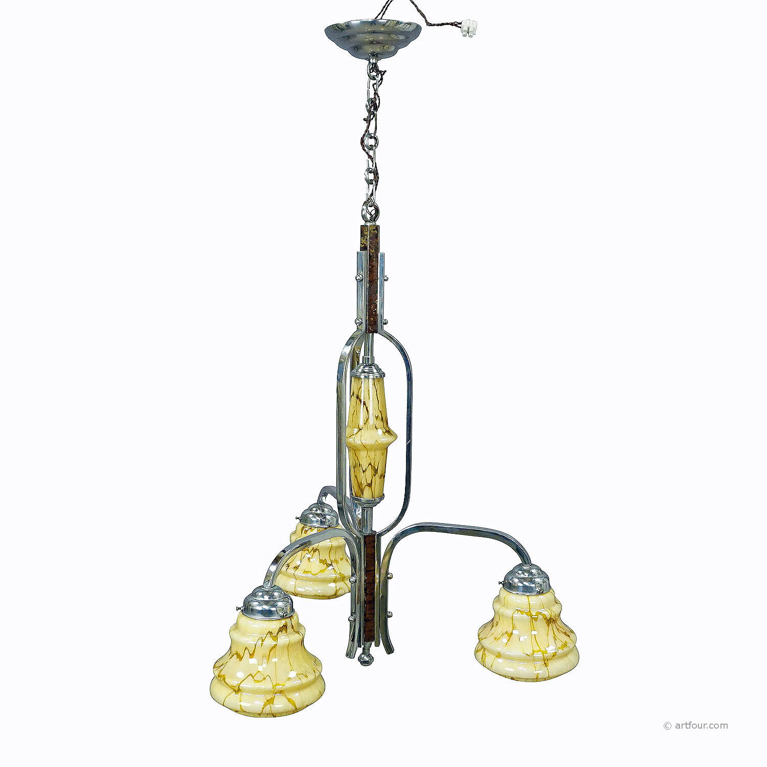 Antique Art Deco chandelier with three glass lampshades.