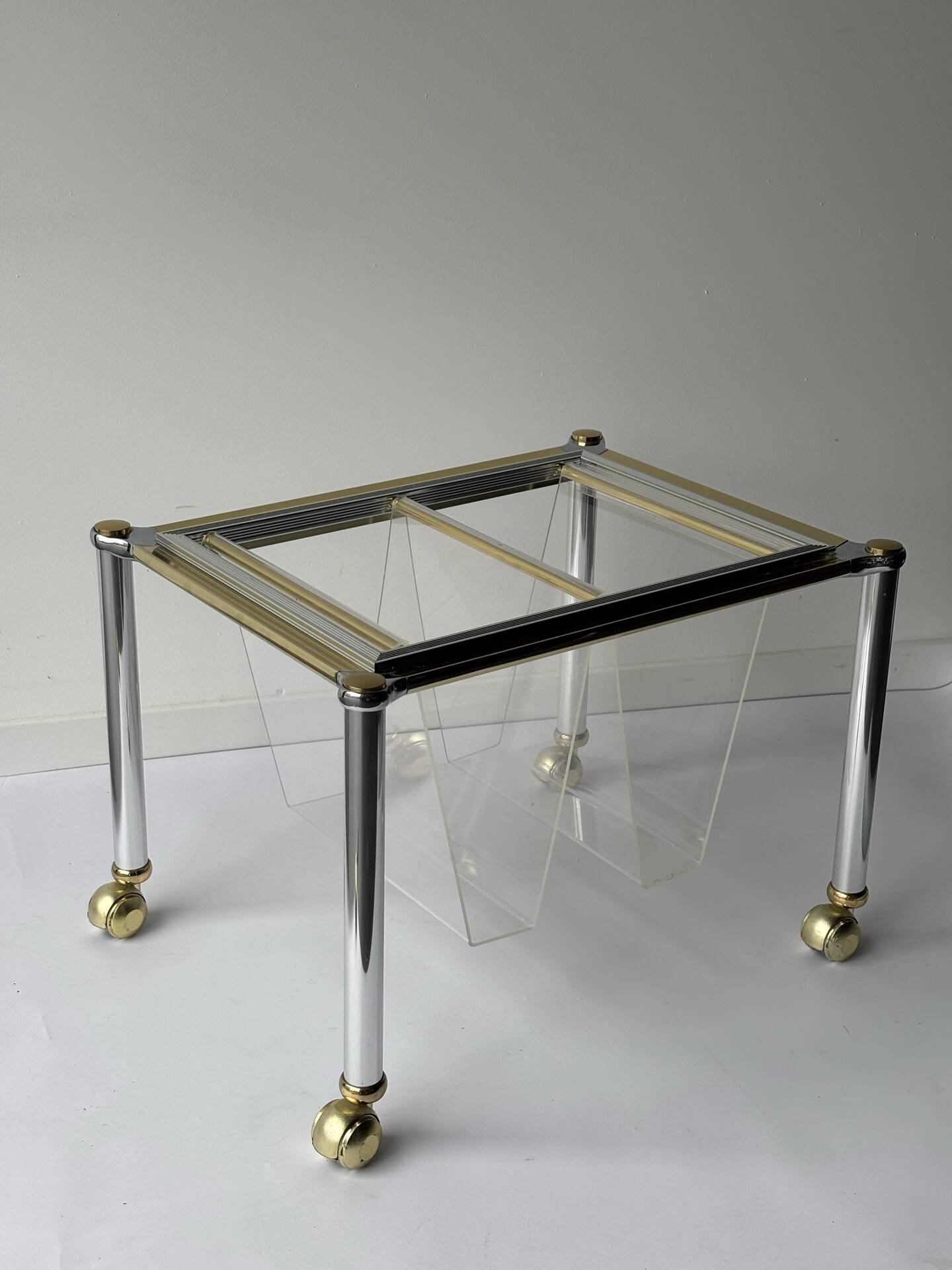 Magazine rack in Plexiglas and gold and chrome metal, 1970