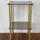 Tables d’appoint en verre et laiton