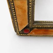 Moroccan brass mirror from the 1980s.