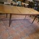 Table scandinave galbée extensible papillon en teck années 60