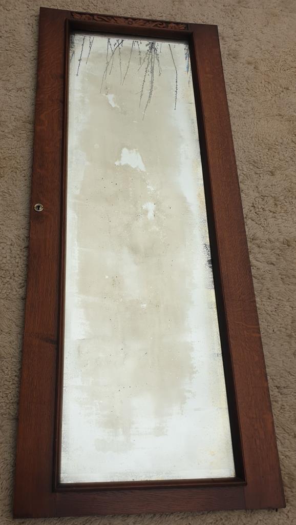 Art Deco door mirror with floral pattern frame