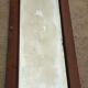 Art Deco door mirror with floral pattern frame