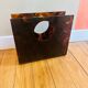Vintage 70's lucite plexi tortoiseshell magazine rack