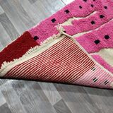 Handwoven Moroccan rug, natural wool, 250cm x 150cm, elegant decoration.
