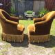 Paire de fauteuils crapauds vintage en velours vert.