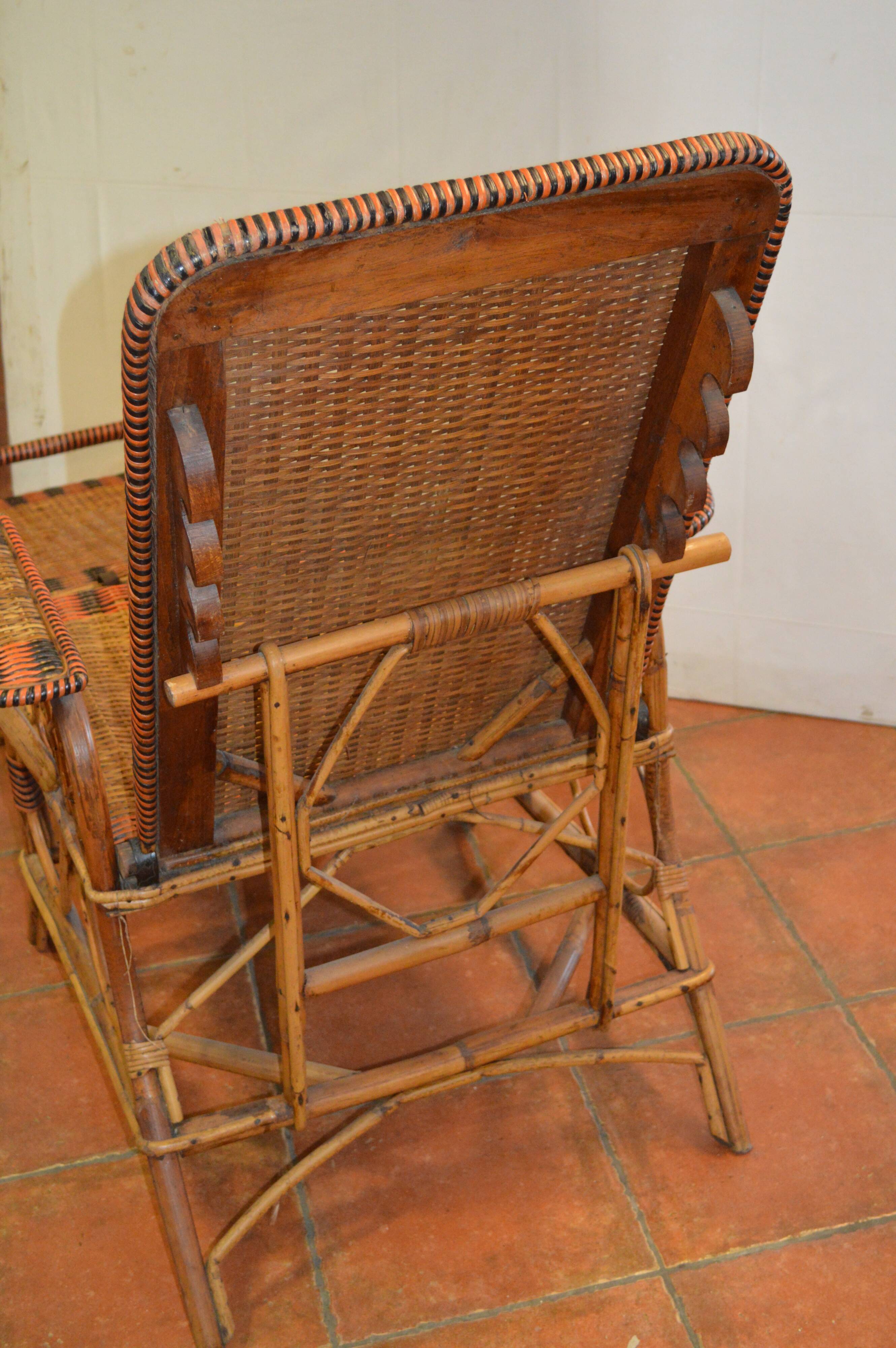 Vintage rattan lounge chair / garden chair