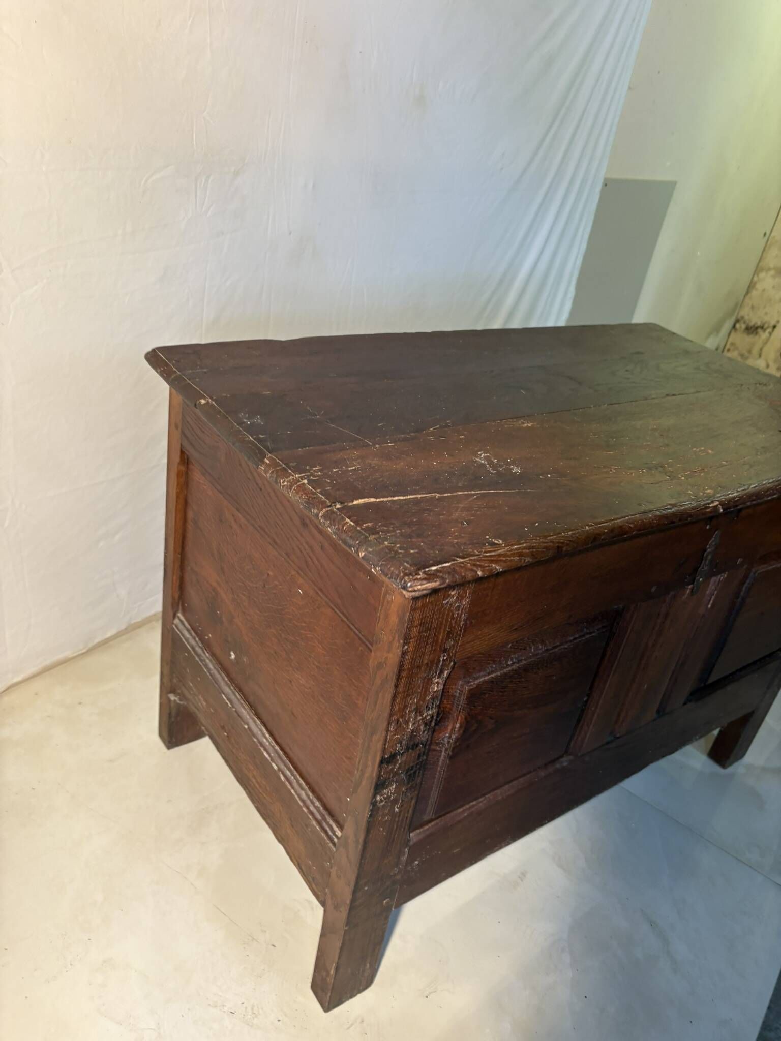 Rustic antique oak chest, original fittings and moulded panels.