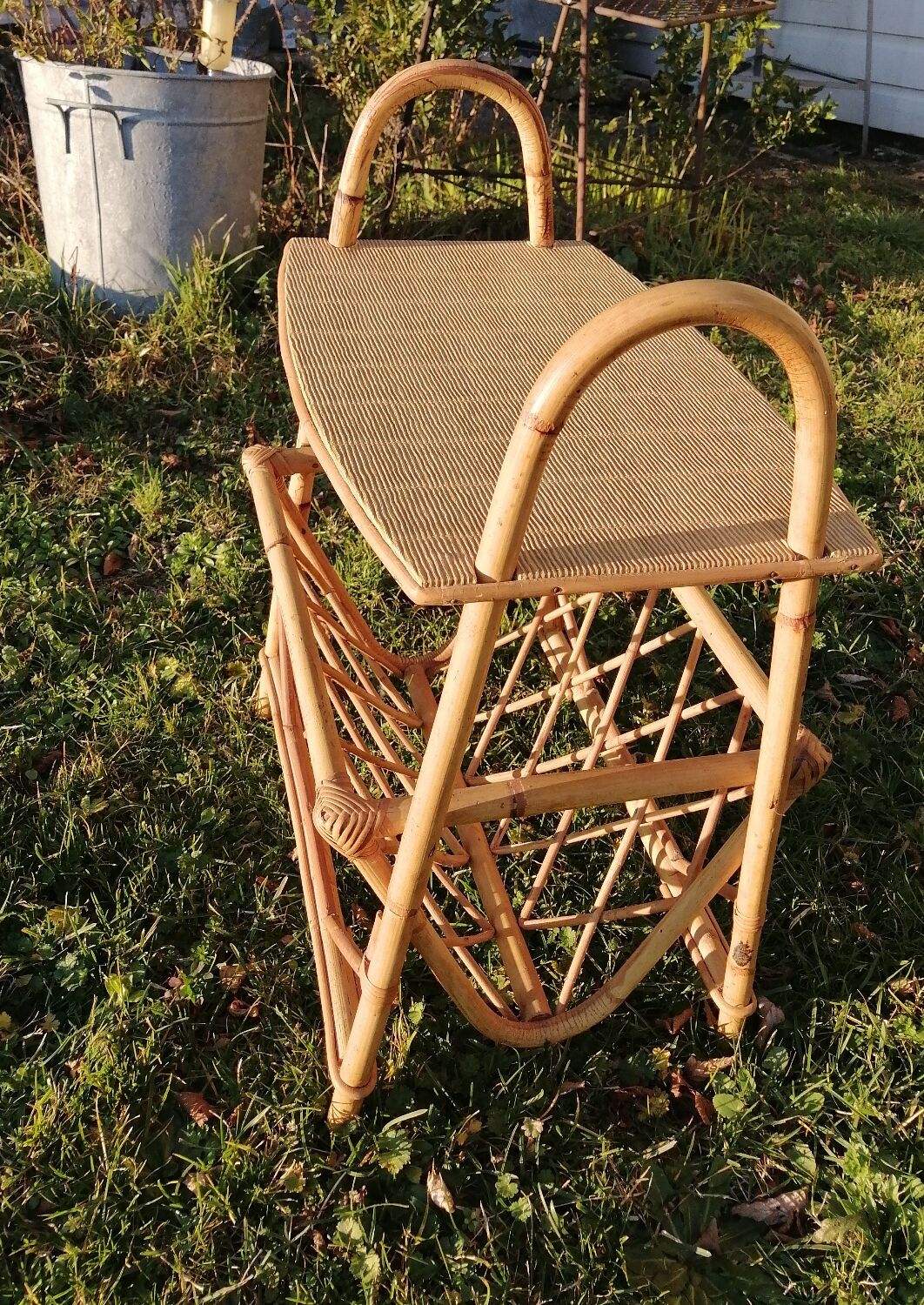 Rattan table at the end of the sofa