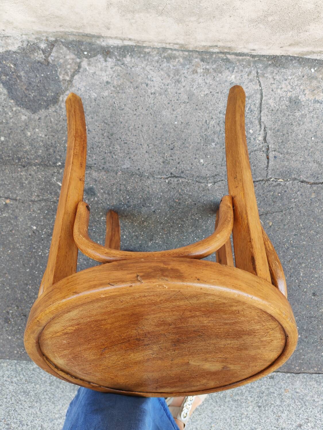 Curved wooden stool