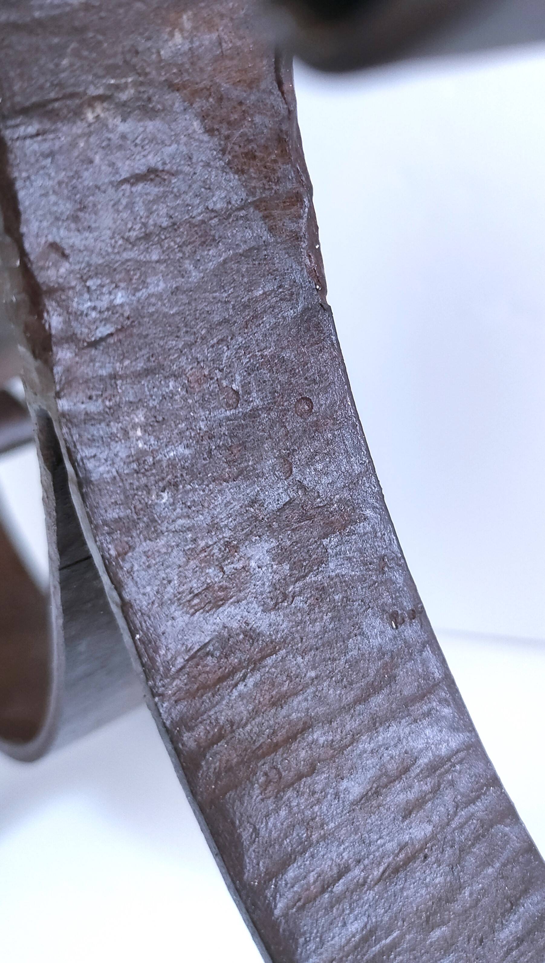 Patinated wrought iron candle holder heart pattern two lights