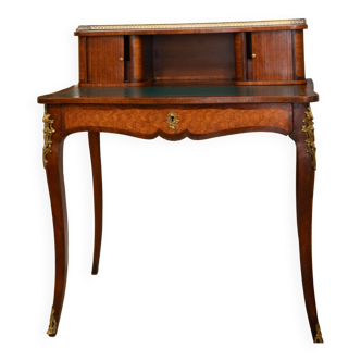 Desk with tiered drawers with inlaid cylinders