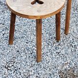 Pair of shepherd's stools in tripod oak décor in the heart