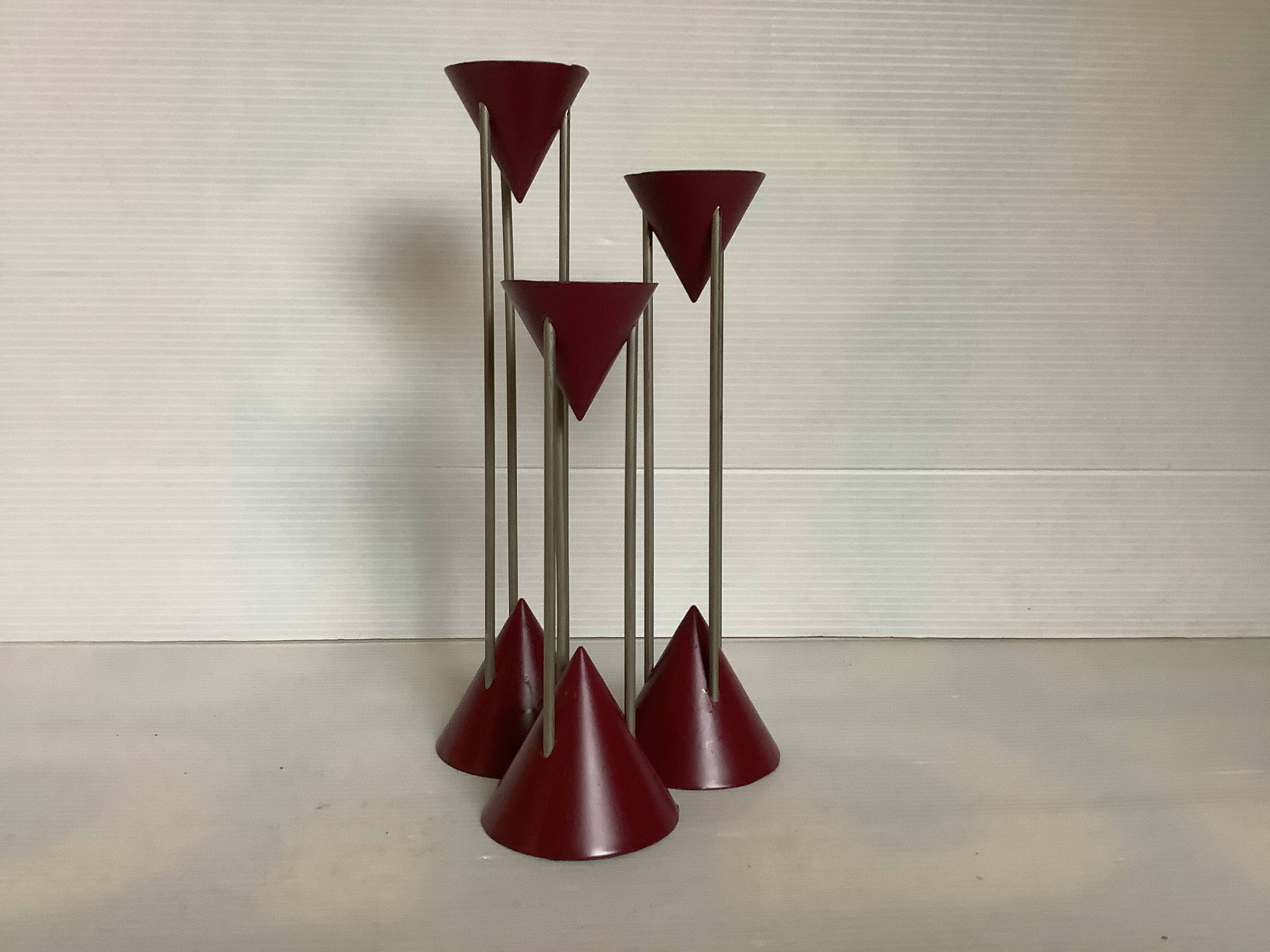 Trio of vintage burgundy candlesticks