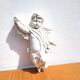 White plaster angel wall decoration