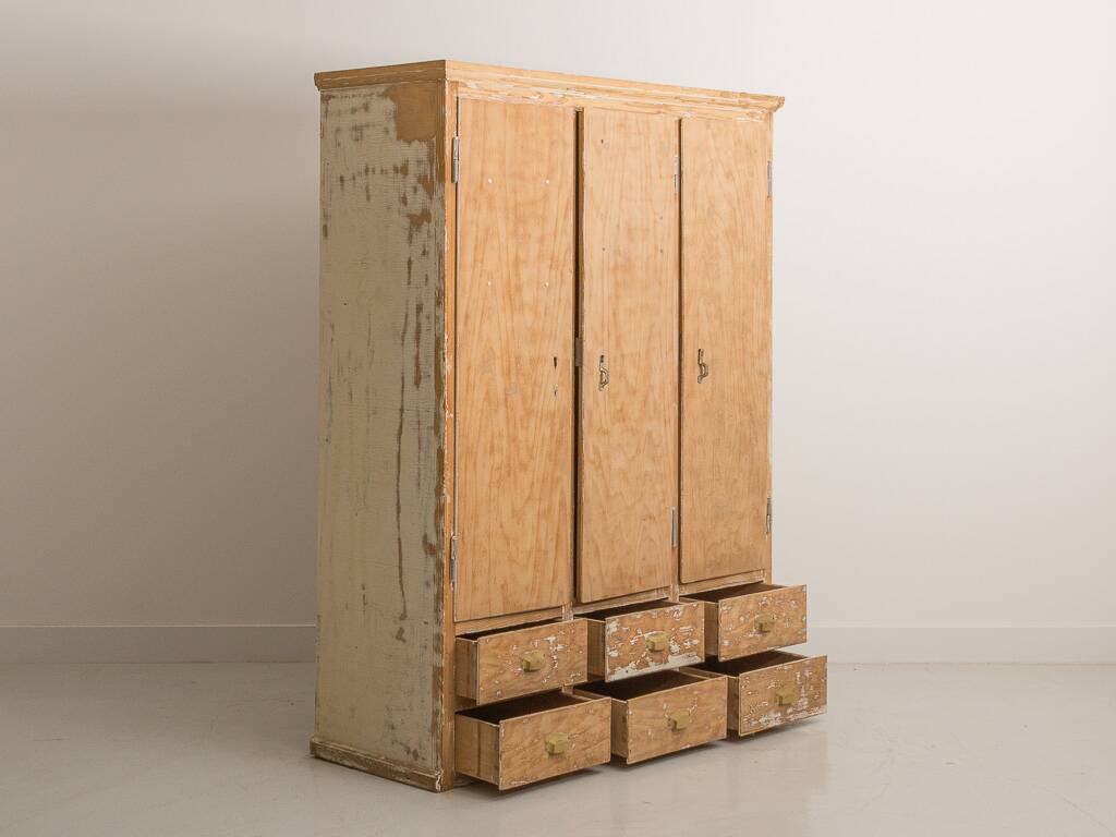 Solid pine cabinet fully stripped consisting of 3 doors and 6 drawers