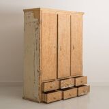 Solid pine cabinet fully stripped consisting of 3 doors and 6 drawers